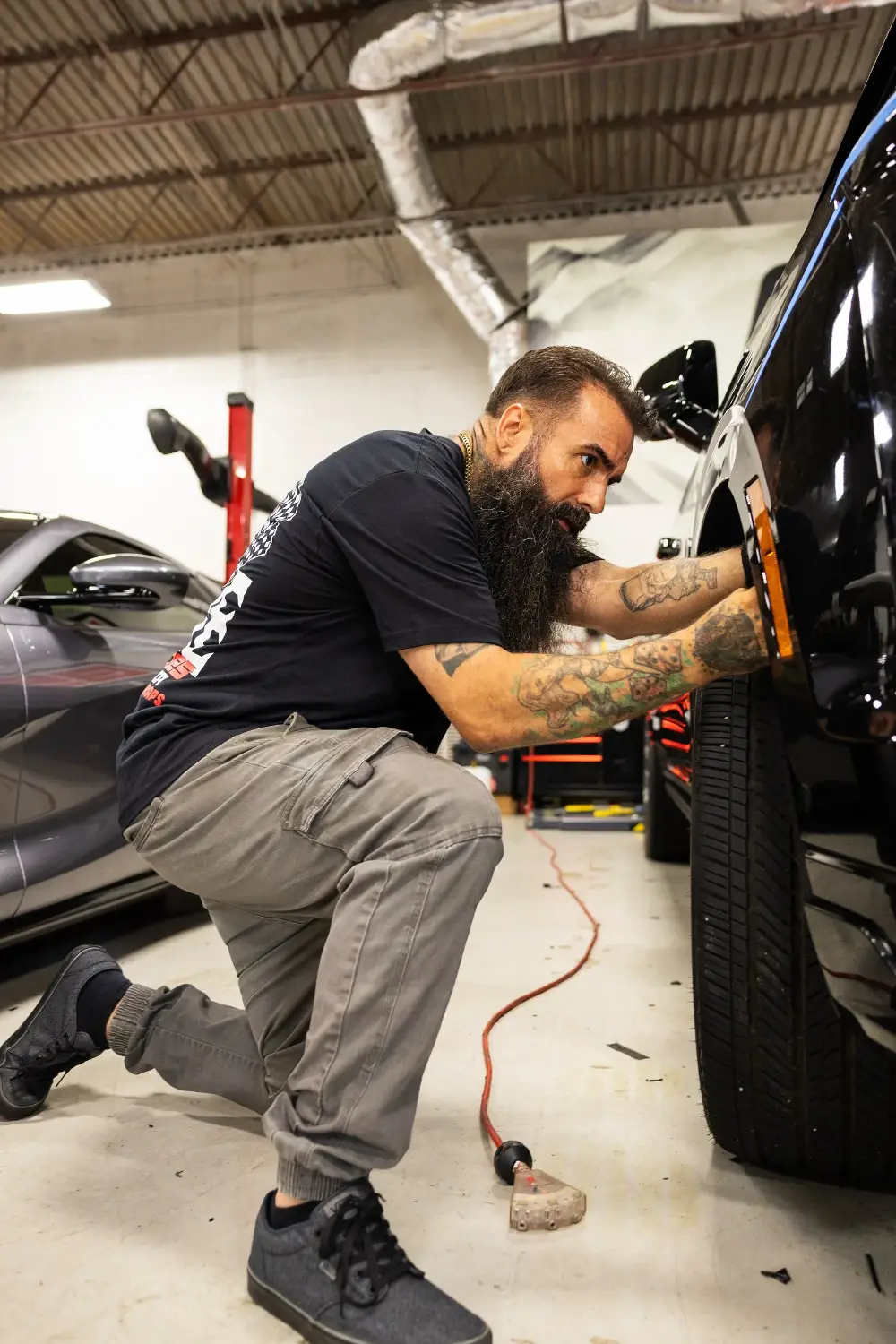Chris Joerger detailing a fender marker light at Big Shot Rides in Coconut Creek
