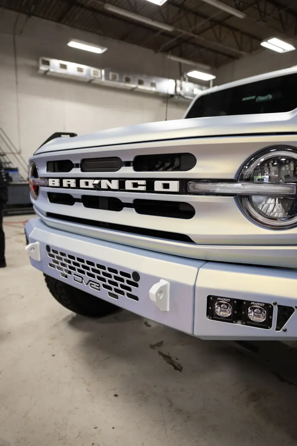 Custom bumper and Rigid pod lights installed on a Ford Bronco at Big Shot Rides