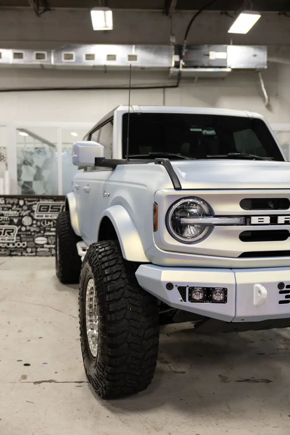 Accessorized Ford Bronco build with bumper, lights, and lift at Big Shot Rides