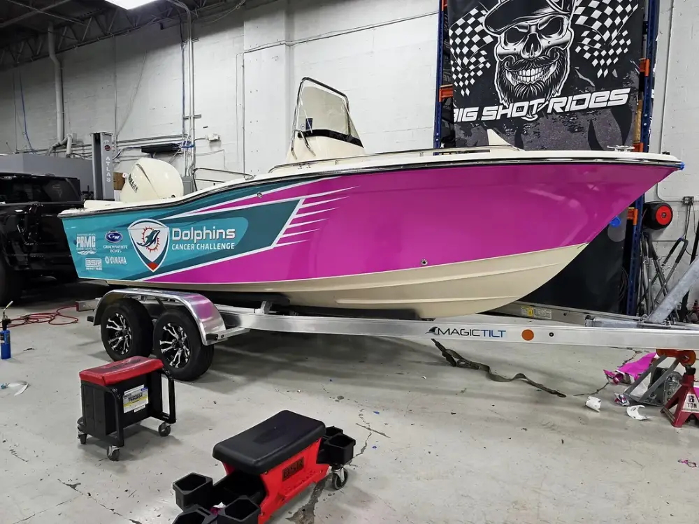 Custom boat wrap graphics installed by Big Shot Rides