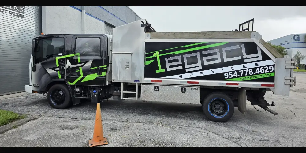 Legacy Services fleet work truck wrap by Big Shot Rides, matching trailer and truck branding