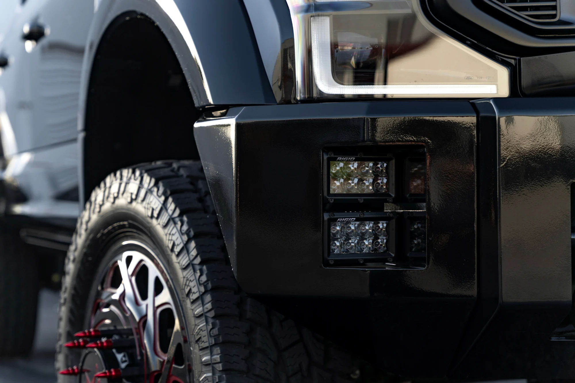 Custom LED headlight detail on a Ford Super Duty at Big Shot Rides, Coconut Creek FL