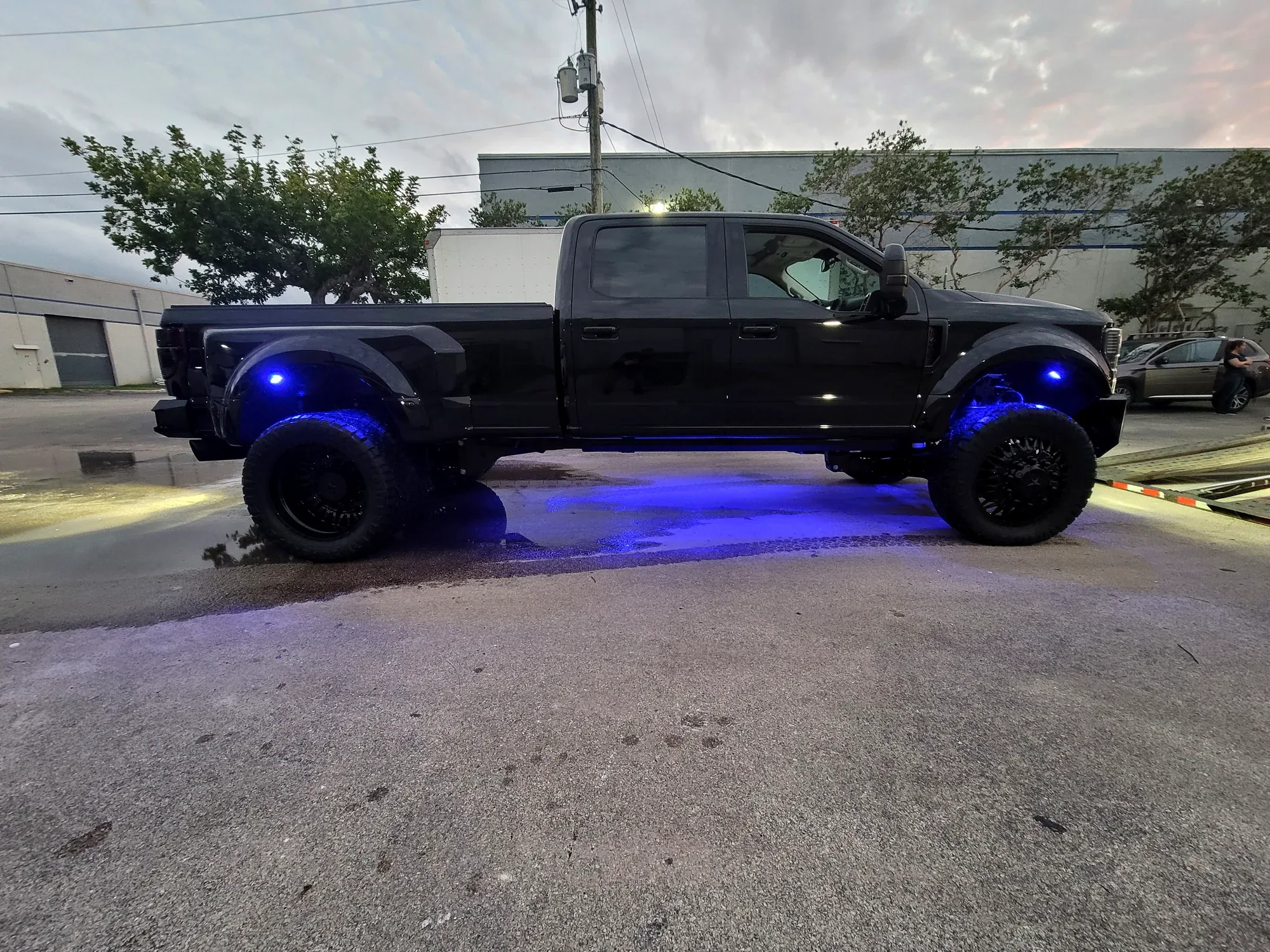 Rough Country pod lights lit in a Ford Raptor bumper at Big Shot Rides, Coconut Creek FL