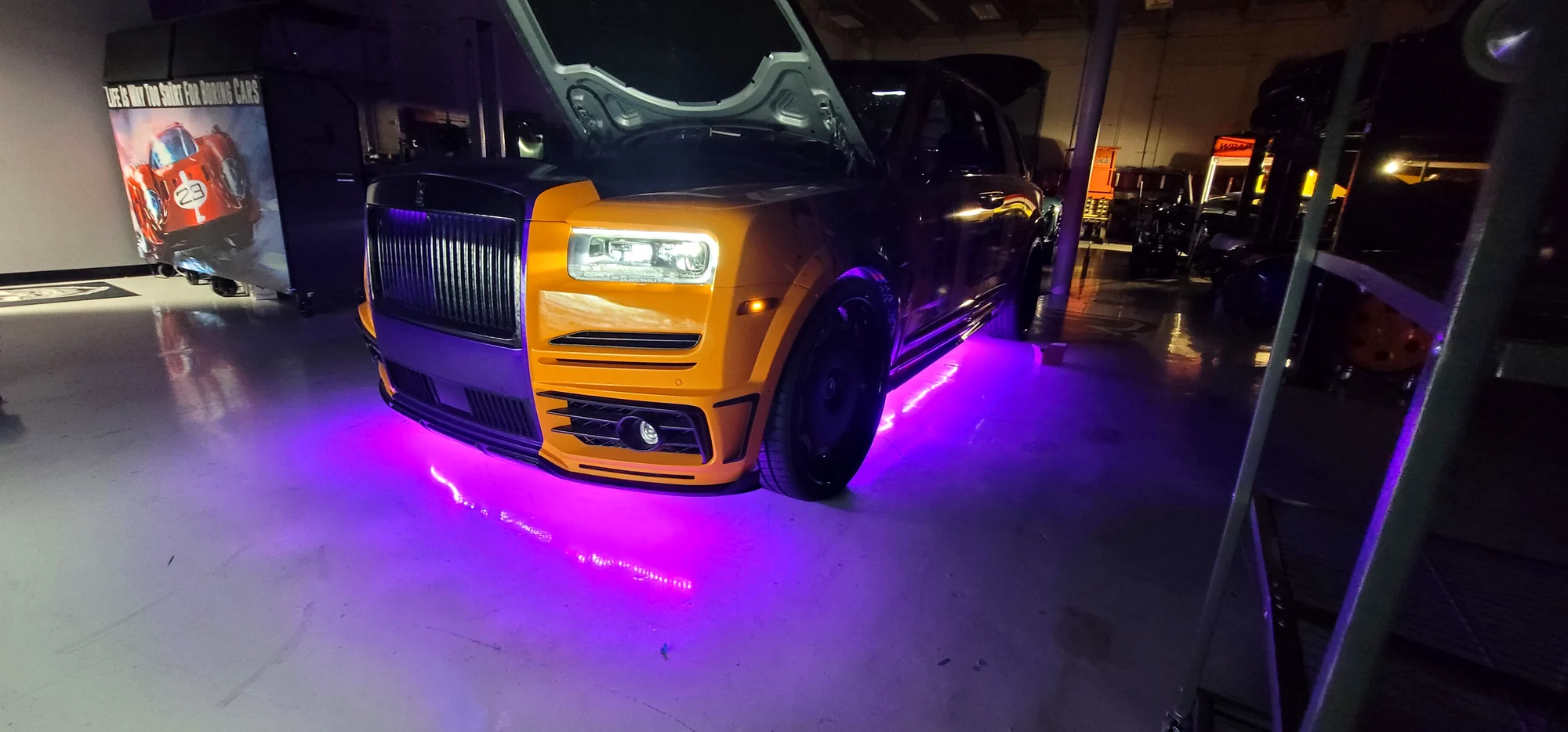 Rolls-Royce Cullinan with purple underglow lighting installed at Big Shot Rides, Coconut Creek FL