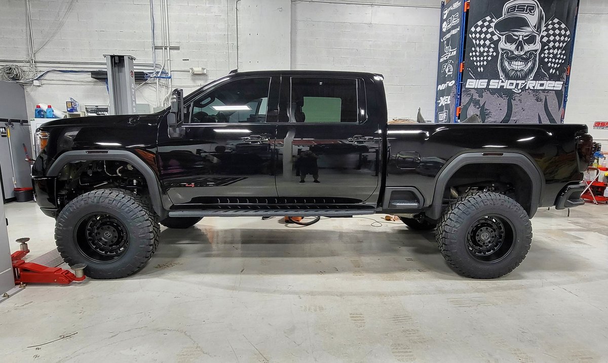 Black lifted Chevrolet Silverado HD truck with BDS suspension and Fox shocks at Big Shot Rides