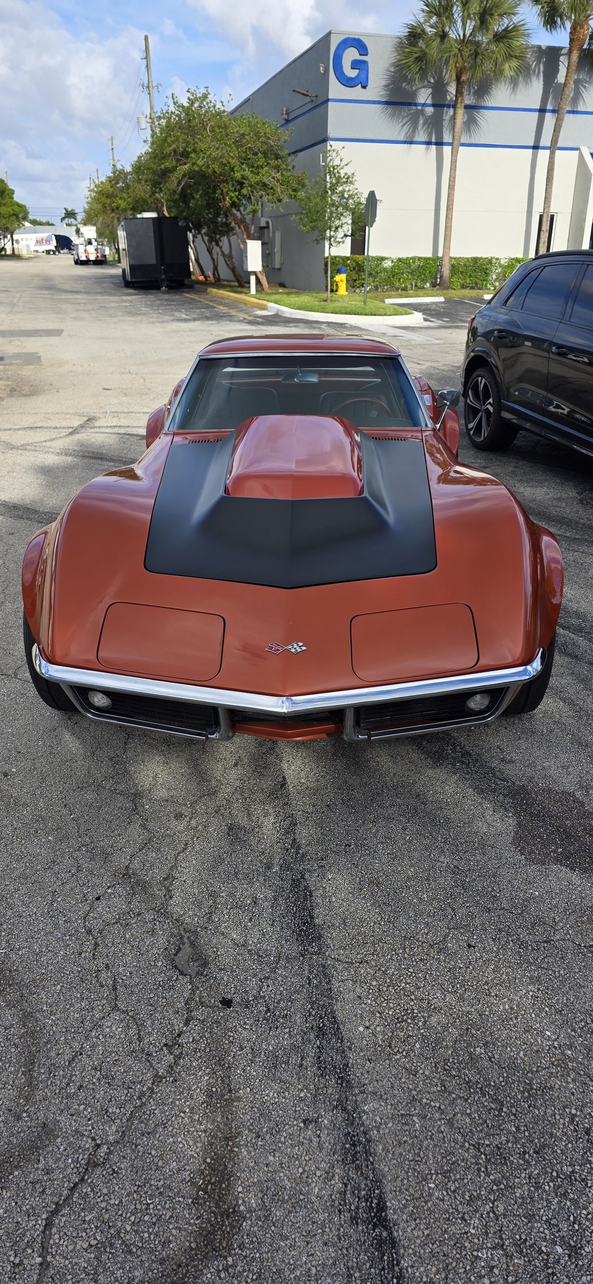 Classic orange convertible restomod build at Big Shot Rides Coconut Creek