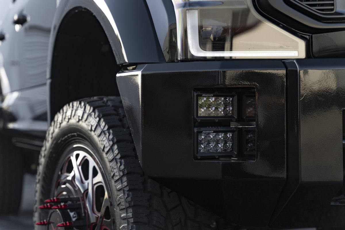 Ford F-450 custom bumper with integrated dual LED light pods detail at Big Shot Rides
