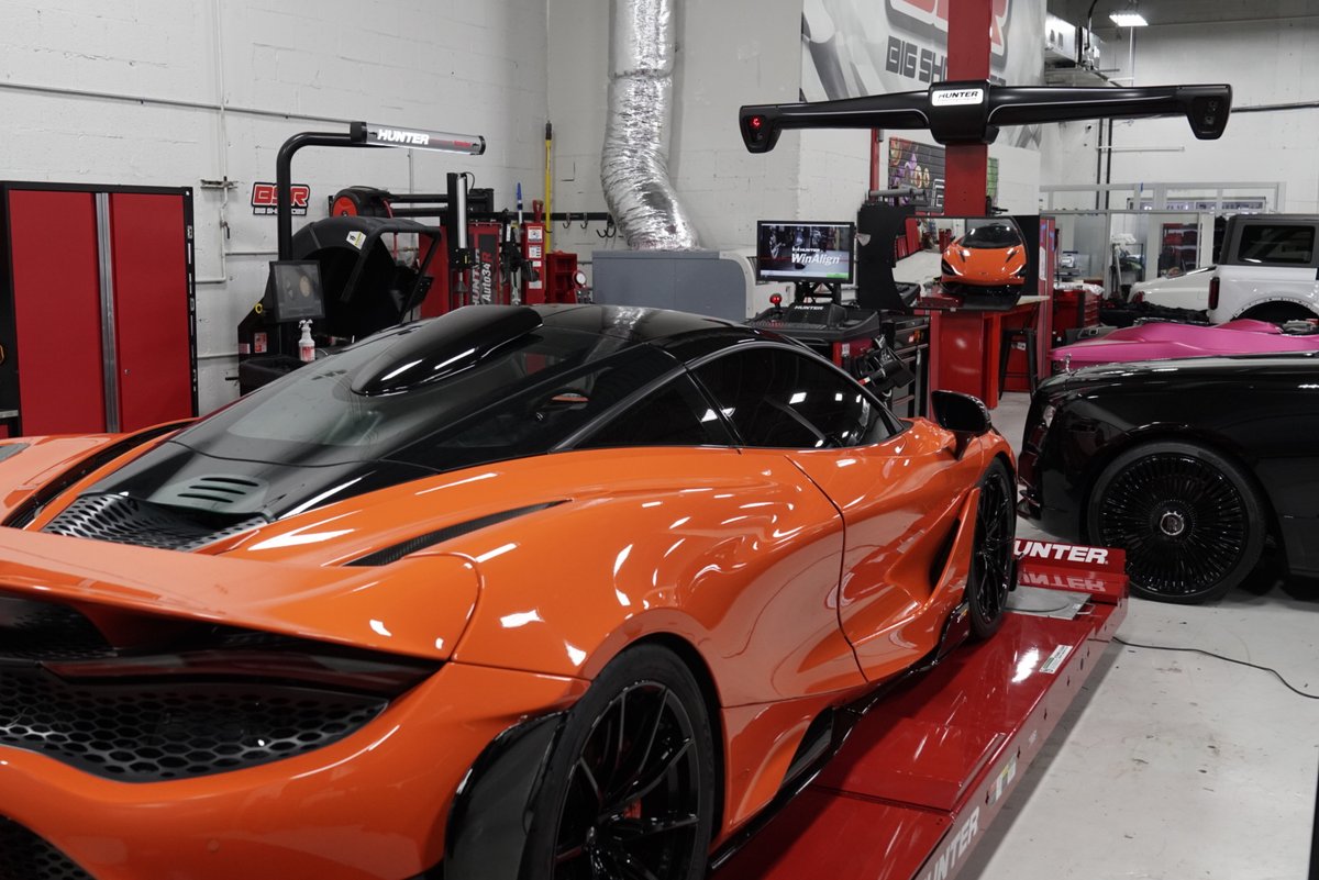 McLaren 720S on the Hunter Hawkeye Elite alignment rack at Big Shot Rides in Coconut Creek FL