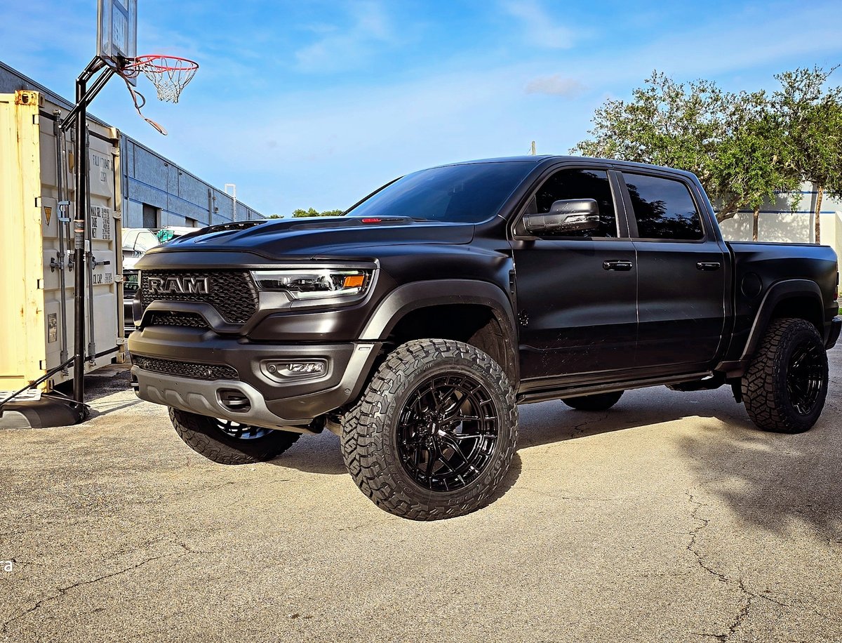 Black RAM TRX with off-road all-terrain tires at Big Shot Rides Coconut Creek