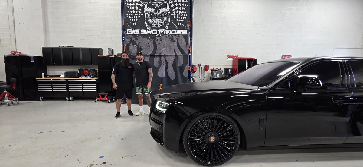 Black Rolls-Royce Ghost on custom wheels and tires with the Big Shot Rides team at the Coconut Creek shop