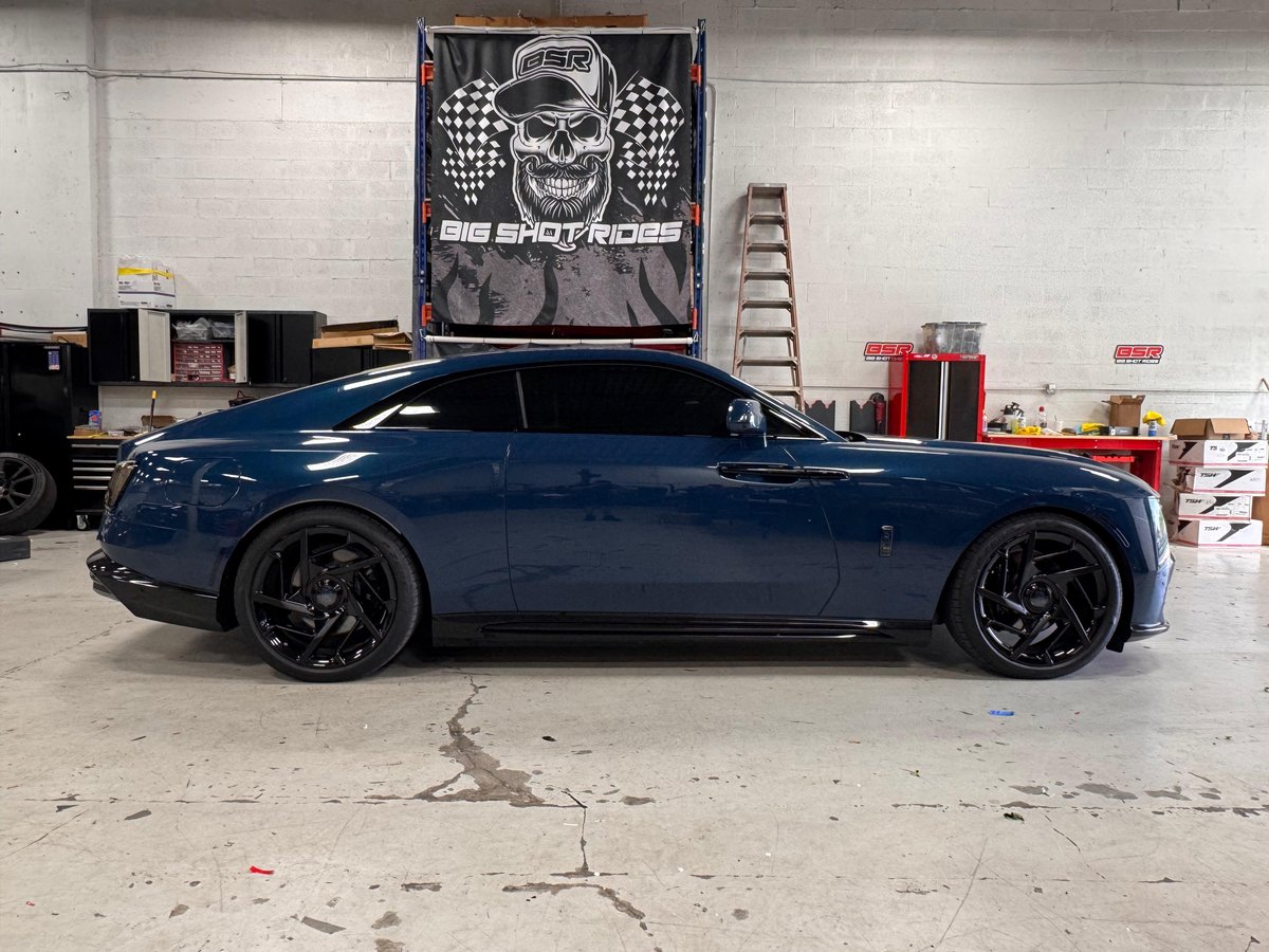 Blue Rolls-Royce Spectre lowered at Big Shot Rides Coconut Creek FL