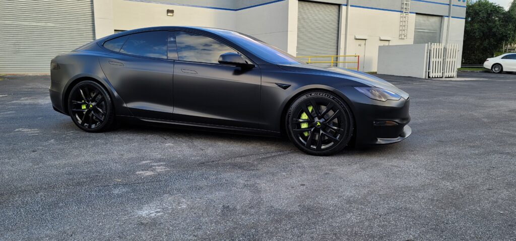 Tesla Model S Plaid finished in a satin black vinyl wrap at Big Shot Rides in Coconut Creek, Florida